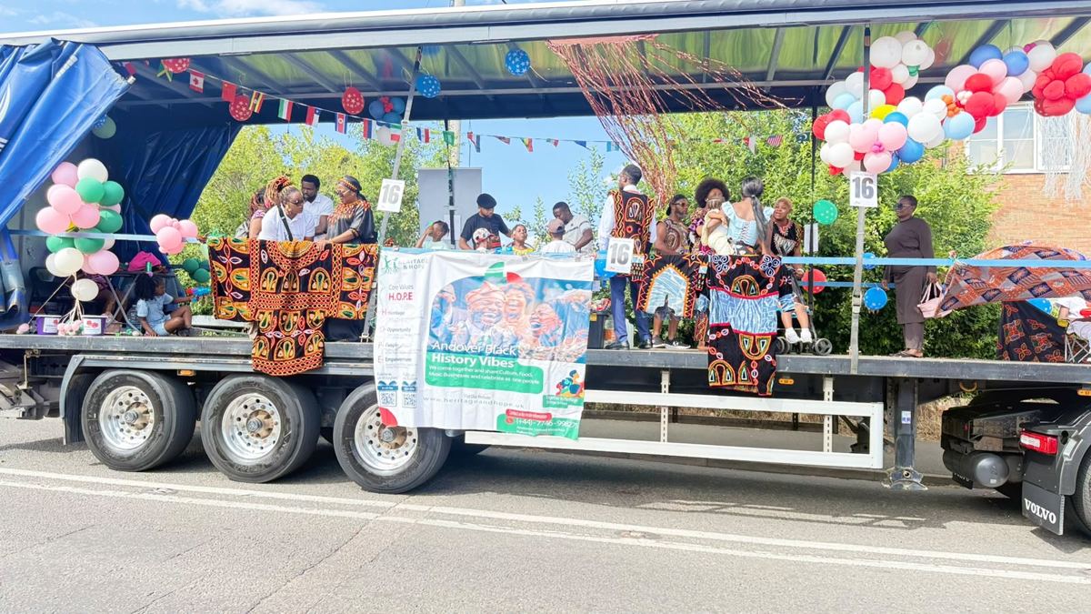 Heritage & Hope carnival float decorated with balloons