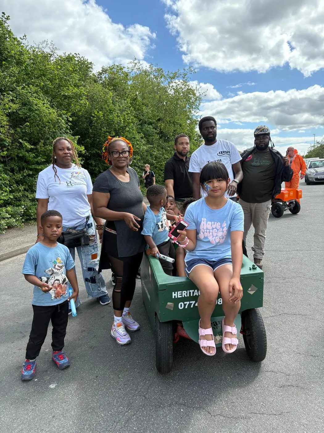 Family with their soapbox cart