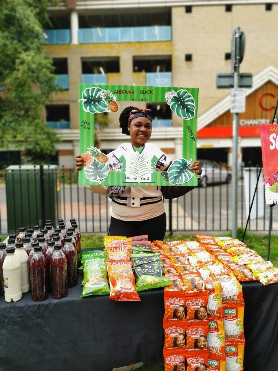 Heritage & Hope community wellbeing stall with drinks and snacks at an outdoor event