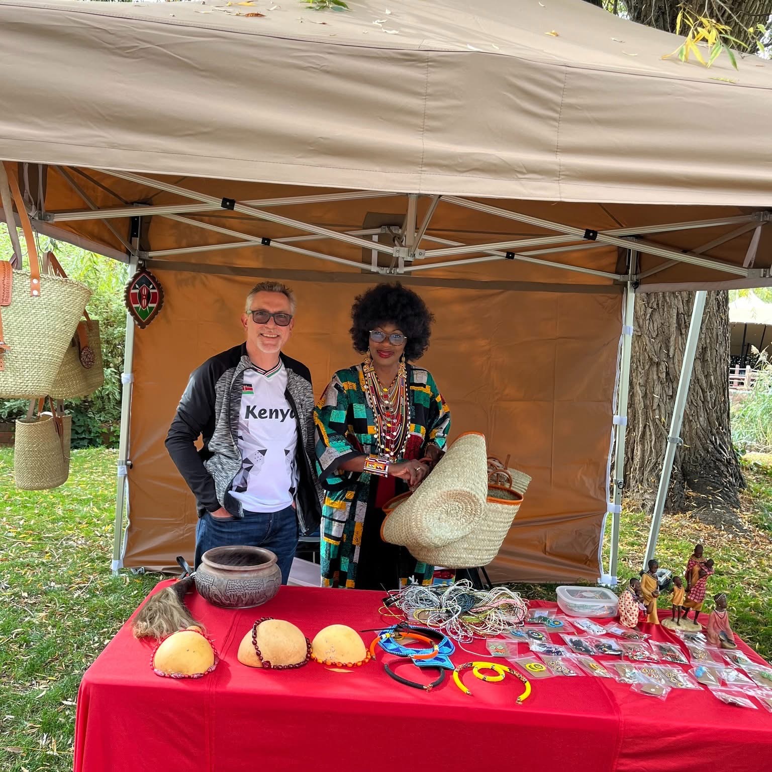 Stallholders with Kenyan crafts, baskets and jewellery